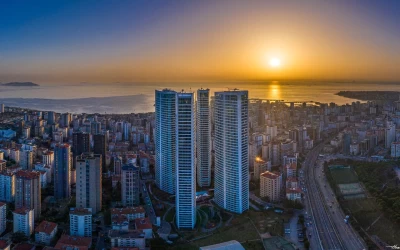 exterior-view-and-distance-shot-of-the-four-unit-residential-building-with-sea-and-city-landscapes-and-sunset-view-behind