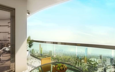 extensive-balcony-of-the-luxurious-residence-furnished-with-a-coffee-table-and-apple-basket-on-it-and-yellow-chair-with-unique-city-view