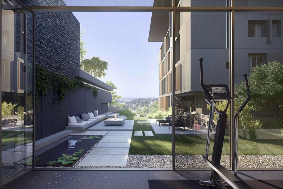 interior-view-of-the-fitness-center-taking-place-in-the-project-and-having-amazing-garden-view-by-which-floor-to-ceiling-window