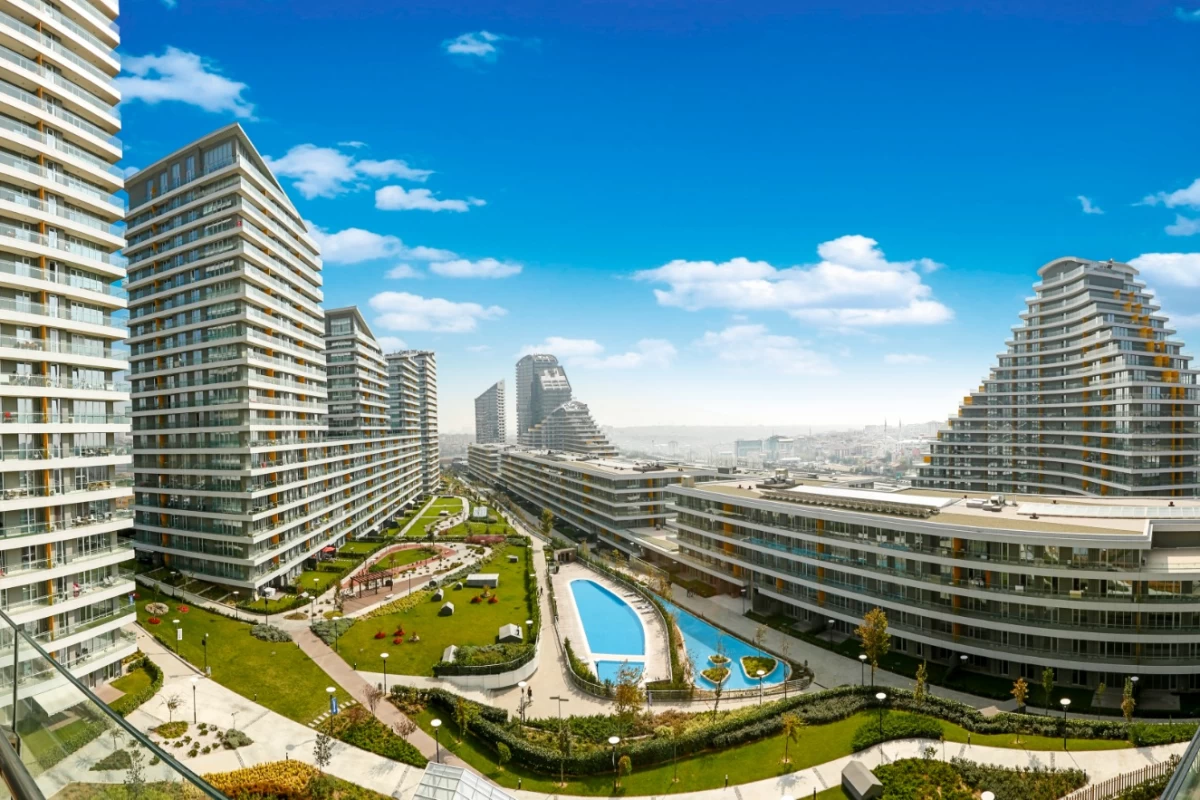 exterior-view-of-the-residential-complexes-providing-a-vast-living-space-with-green-fields-and-walking-paths-for-the-residents