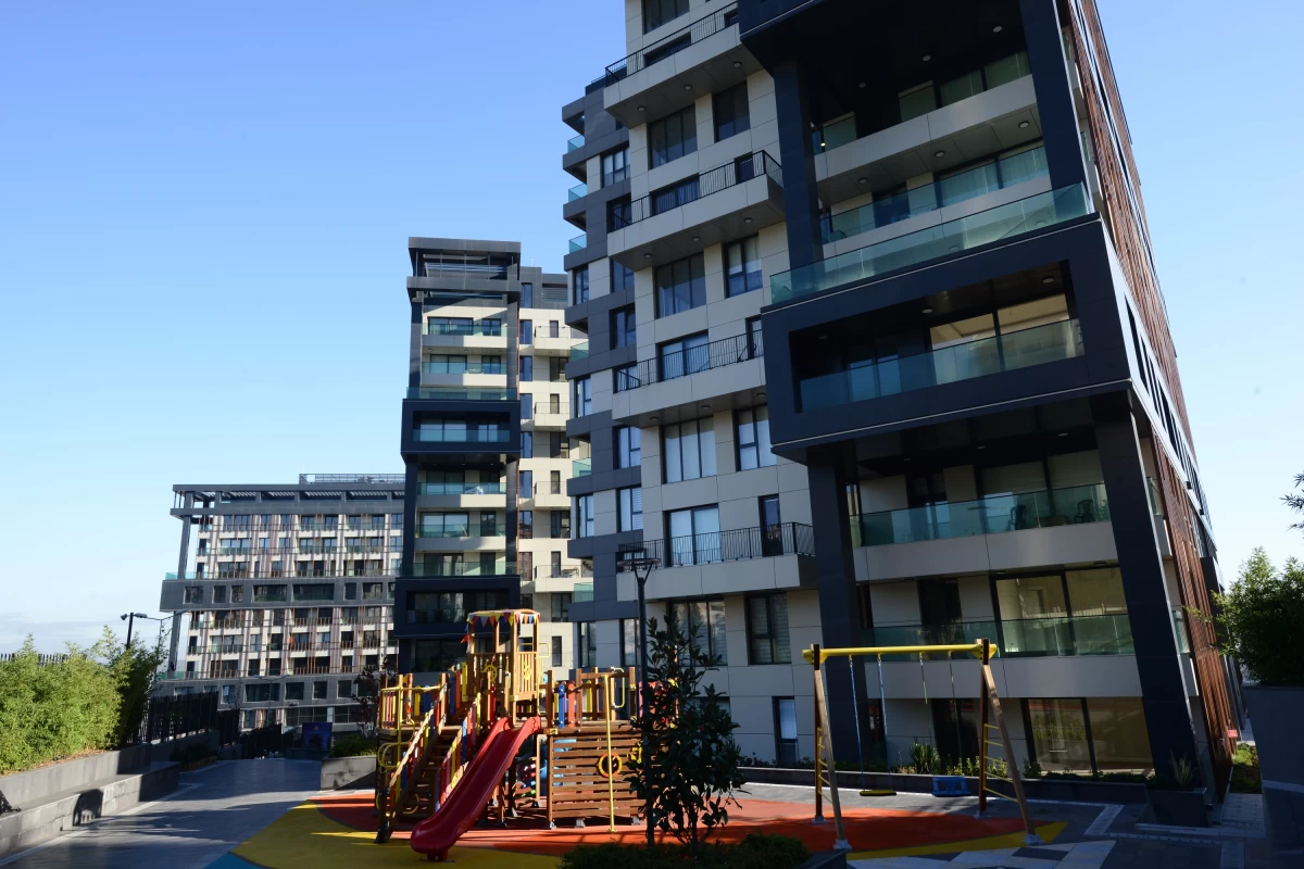 exterior-view-of-the-three-block-residential-project-having-an-exclusive-design-and-including-a-childrens-playground-inside