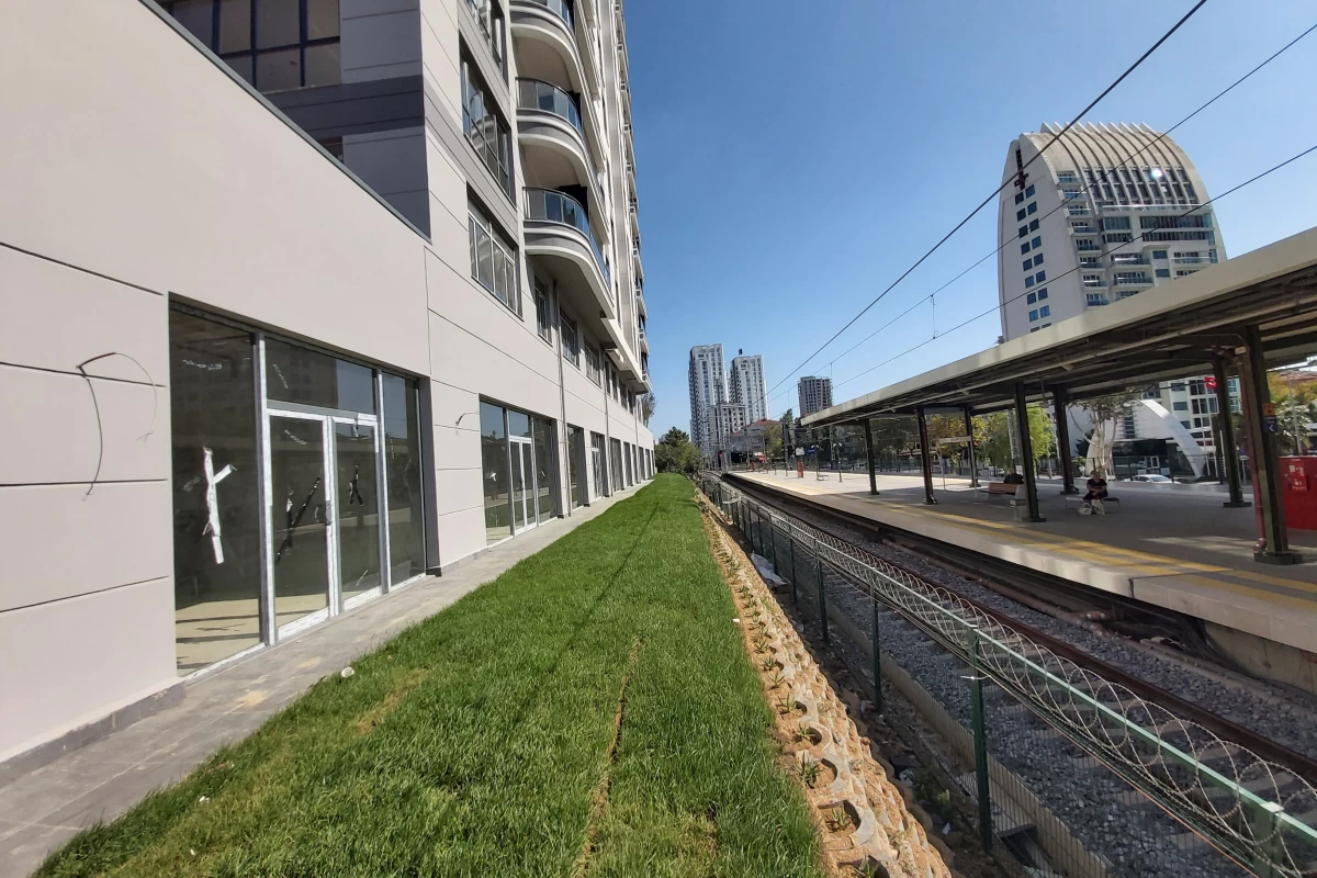 exterior-view-and-close-shot-of-the-railway-taking-place-right-in-front-of-the-residential-project-in-the-kartal-district