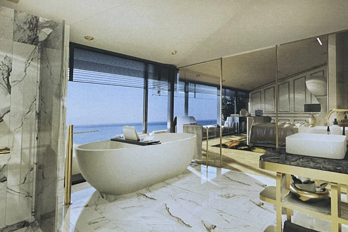 interior-view-of-the-luxurious-and-upscale-bedroom-in-which-the-bathroom-part-with-a-bath-tub-by-the-full-window-side-is-seen