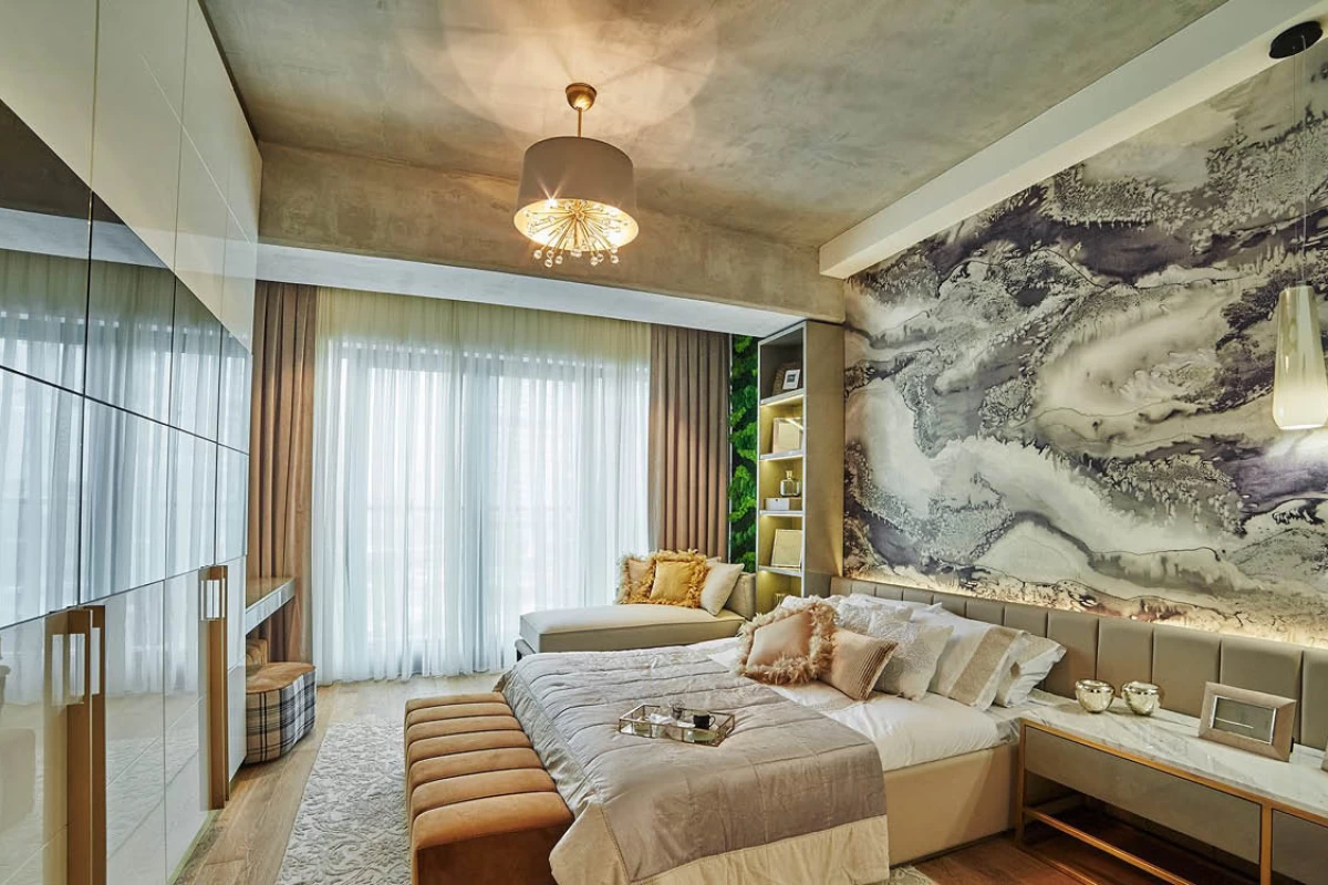 interior-photo-of-an-elegant-and-sophisticated-bedroom-having-a-large-painting-on-the-wall-behind-the-king-size-bed