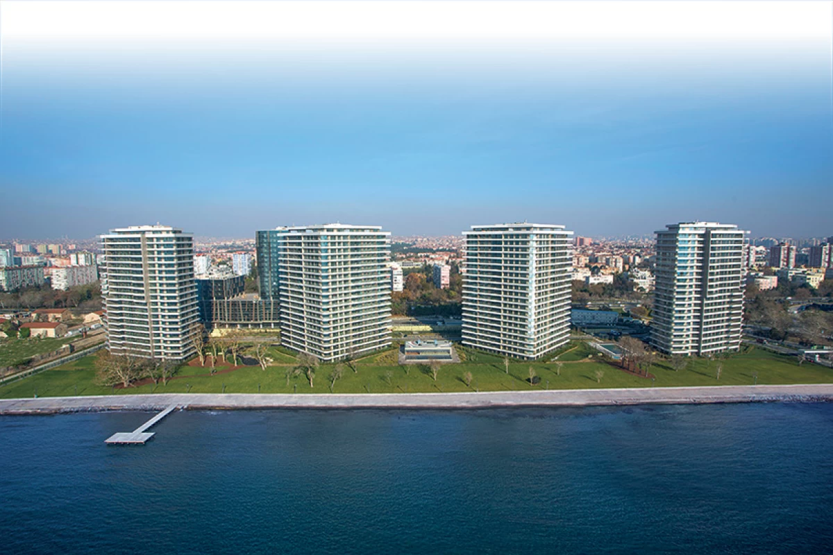 frontal-view-of-the-residential-building-project-with-four-blocks-implemented-nearby-coastline-and-having-amazing-sea-view