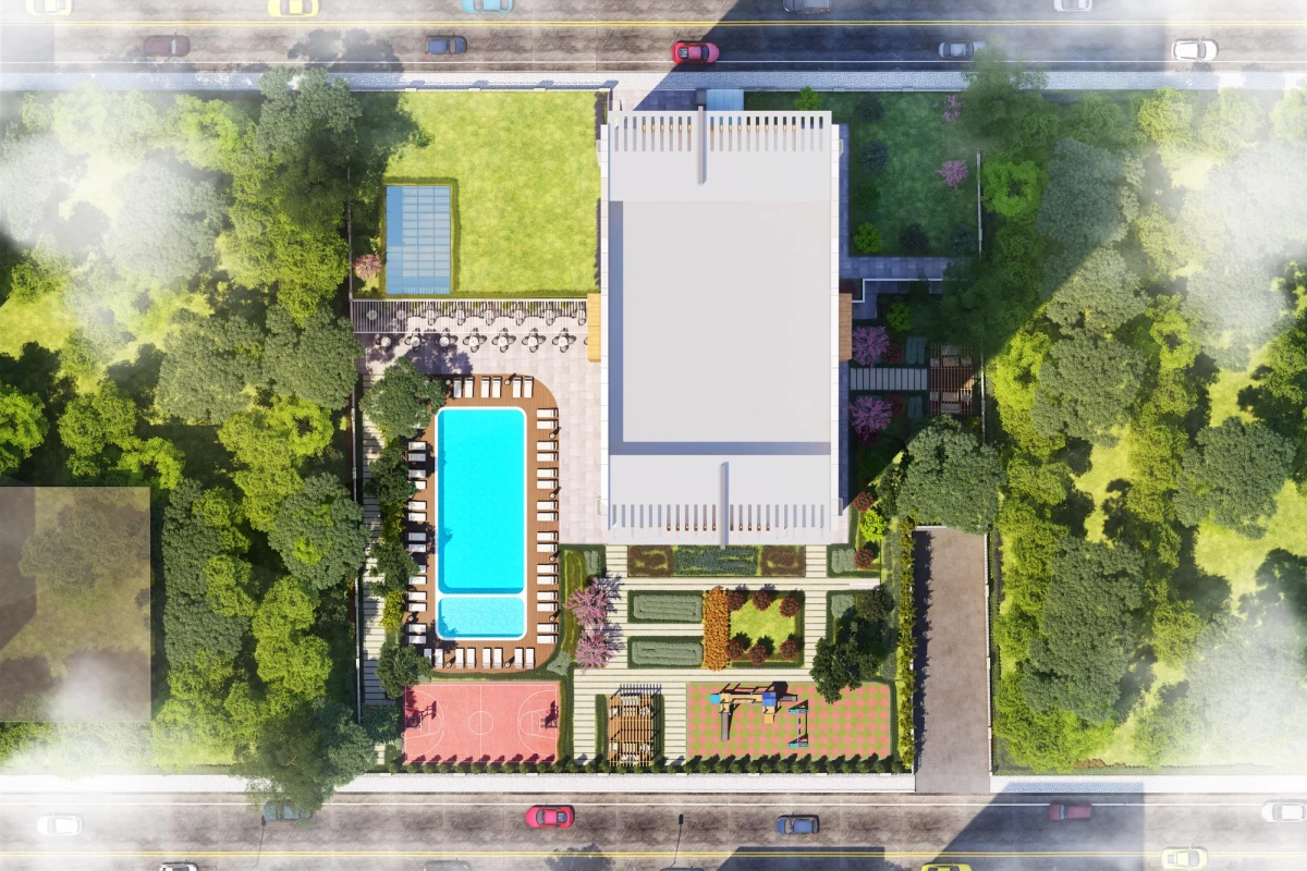 birds-eye-view-of-the-garden-of-the-elegant-residence-next-to-street-designed-with-a-swimming-pool-sunbeds-vast-green-fields-and-playground